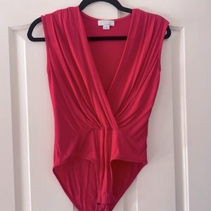 Not my favorite color on me! Hot pink bodysuit